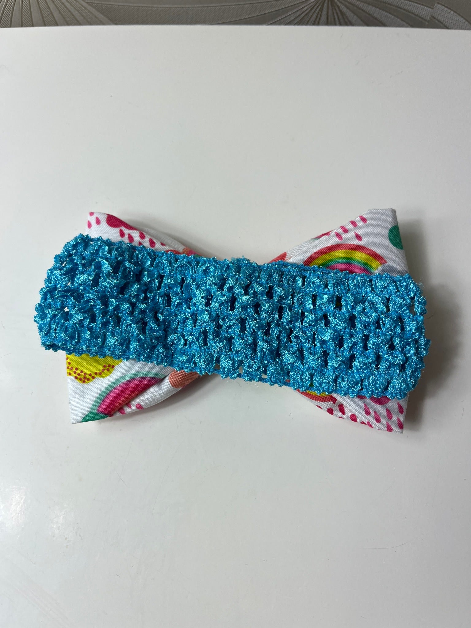 Vaikiška galvajuostė su vaivorykšte ir debesėliu