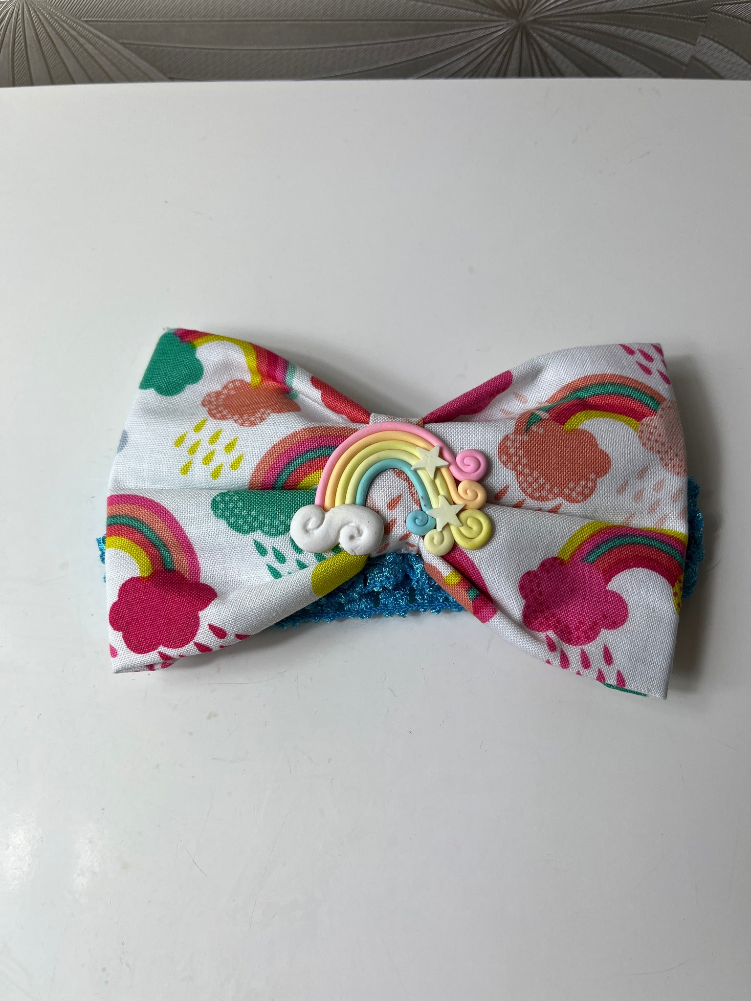 Vaikiška galvajuostė su vaivorykšte ir debesėliu