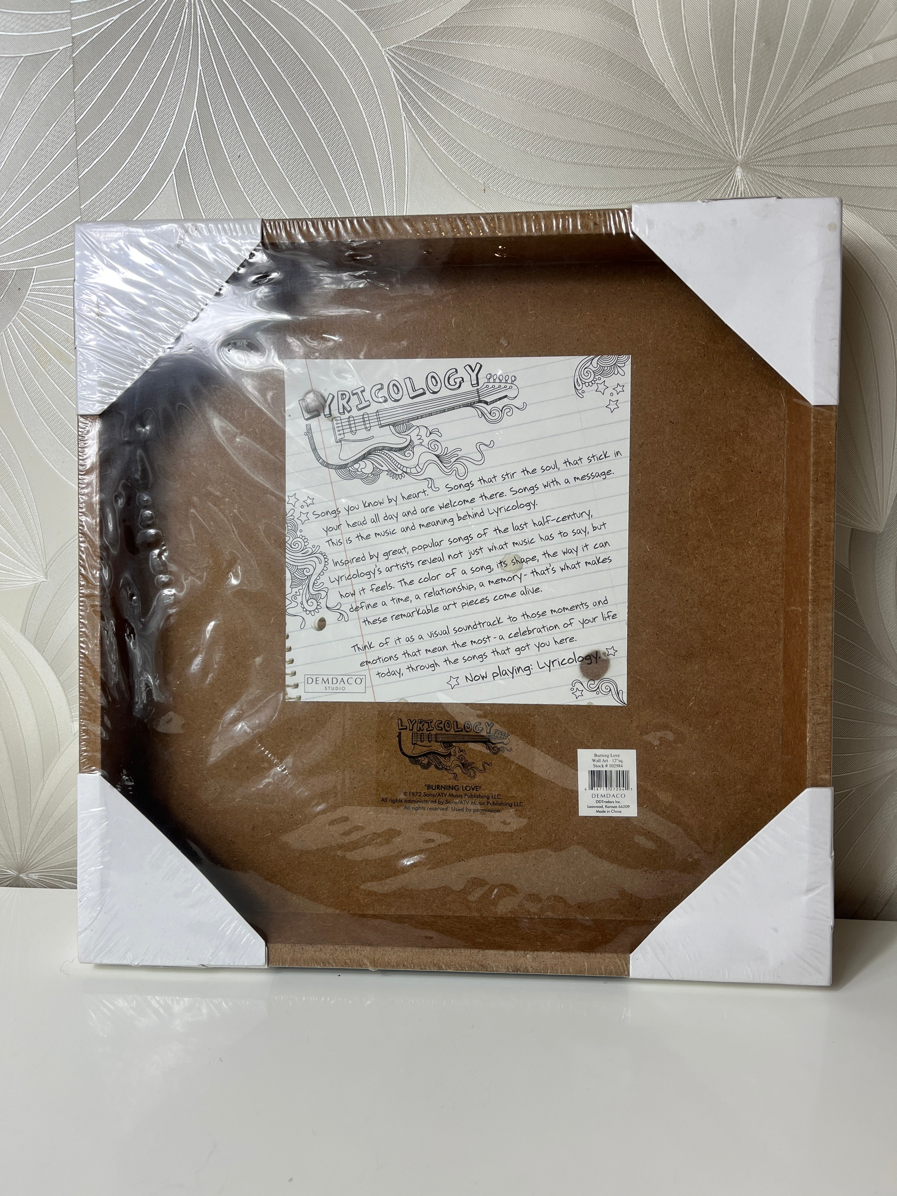 Elvis Presley paveikslėlis su užrašu „Hunk a Hunk Burning Love“