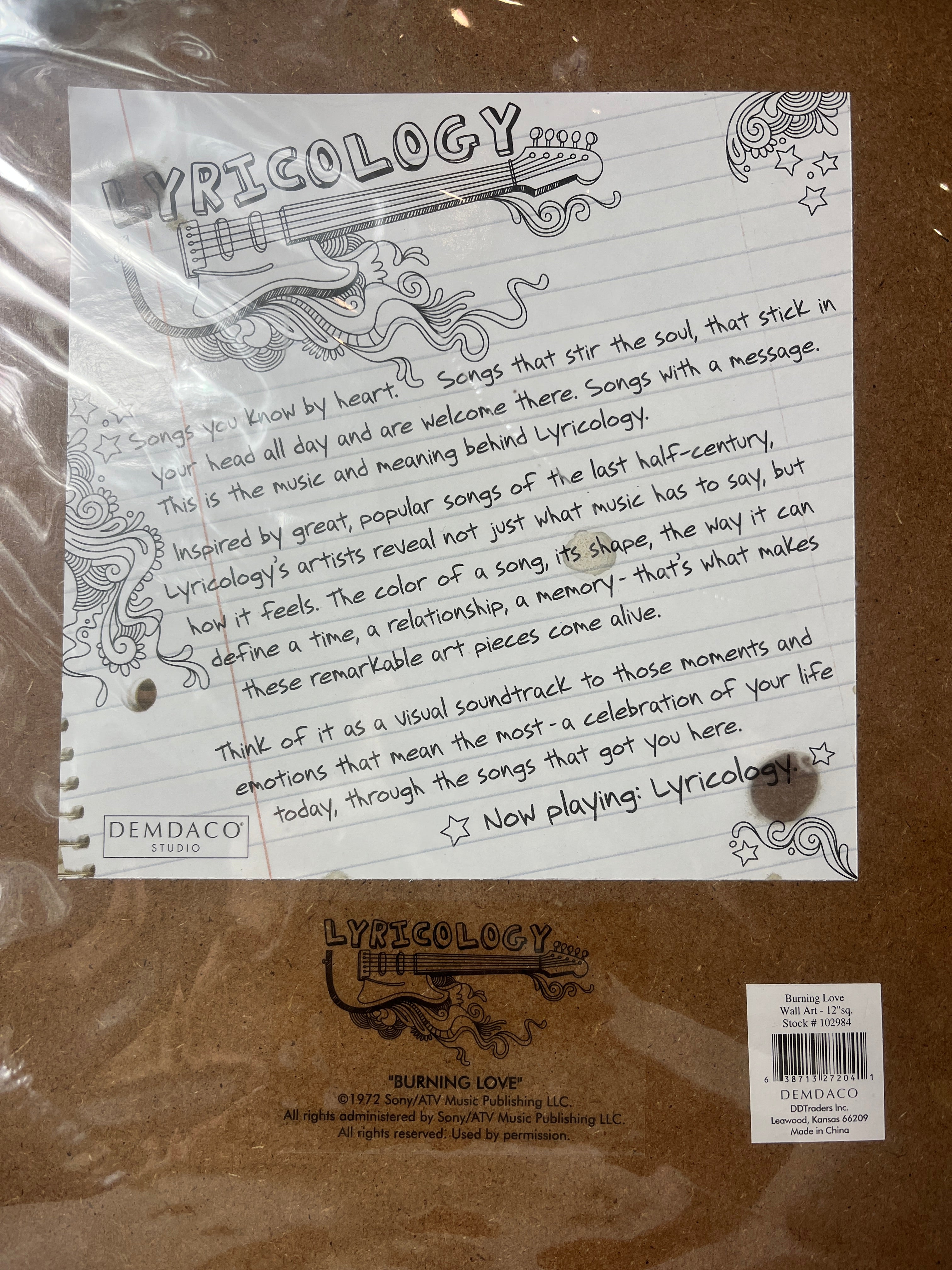 Elvis Presley paveikslėlis su užrašu „Hunk a Hunk Burning Love“