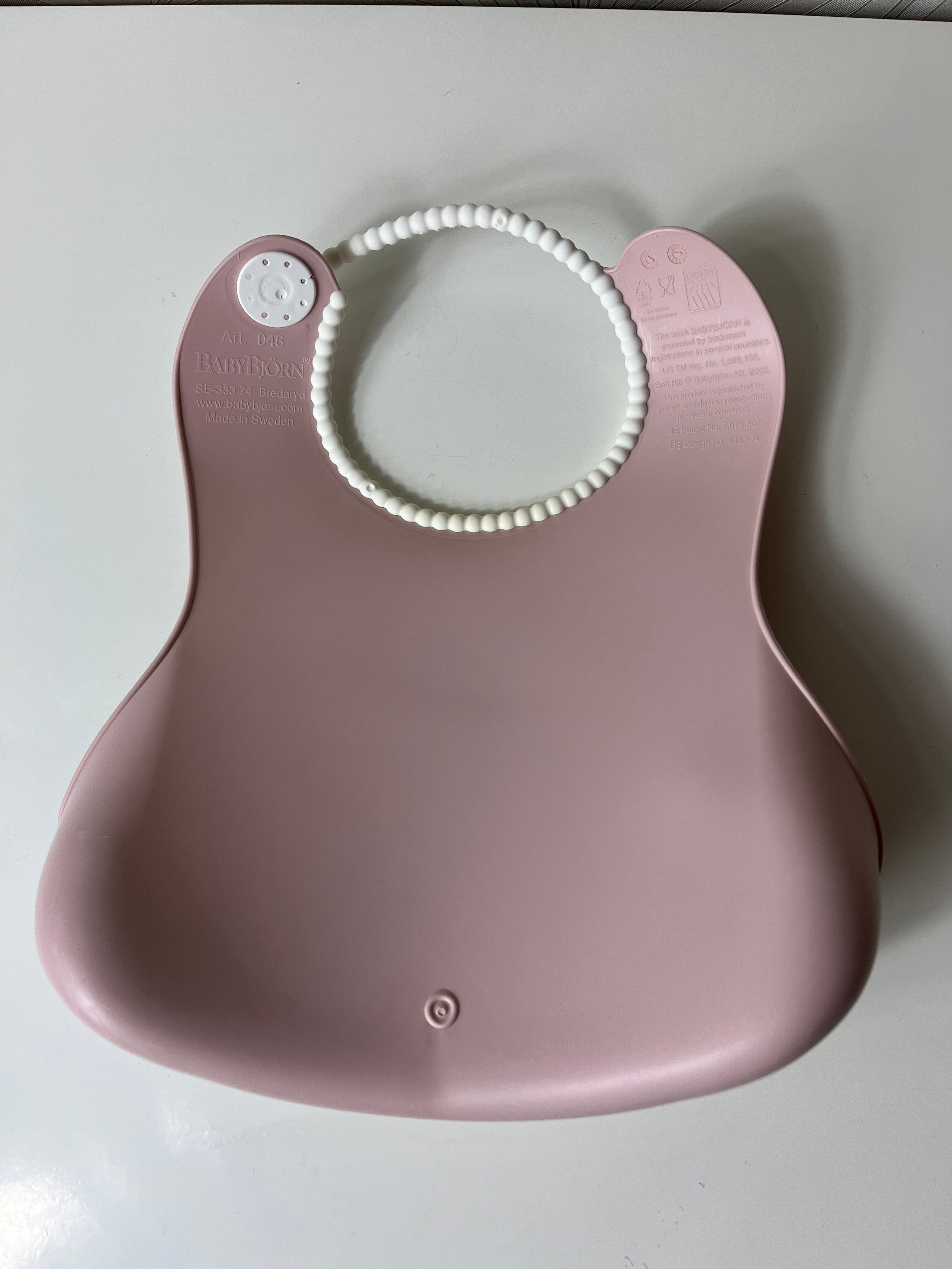 Rožinis seilinukas vaikui „Baby Bjorn“