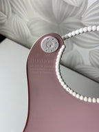 Rožinis seilinukas vaikui „Baby Bjorn“