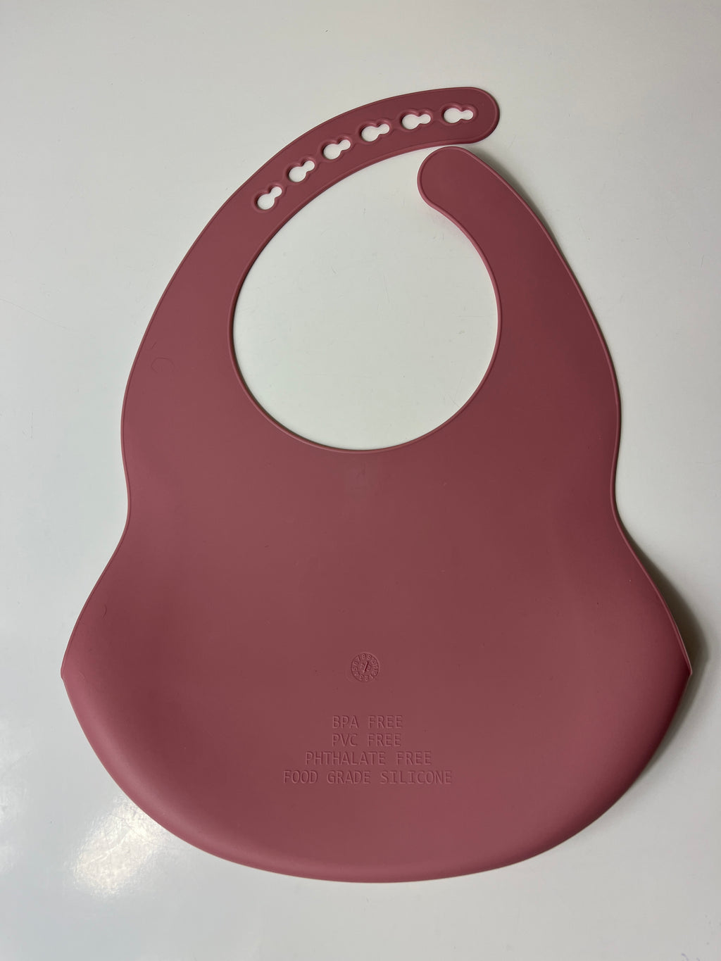 Rausvas silikoninis seilinukas vaikui