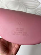 Rausvas silikoninis seilinukas vaikui