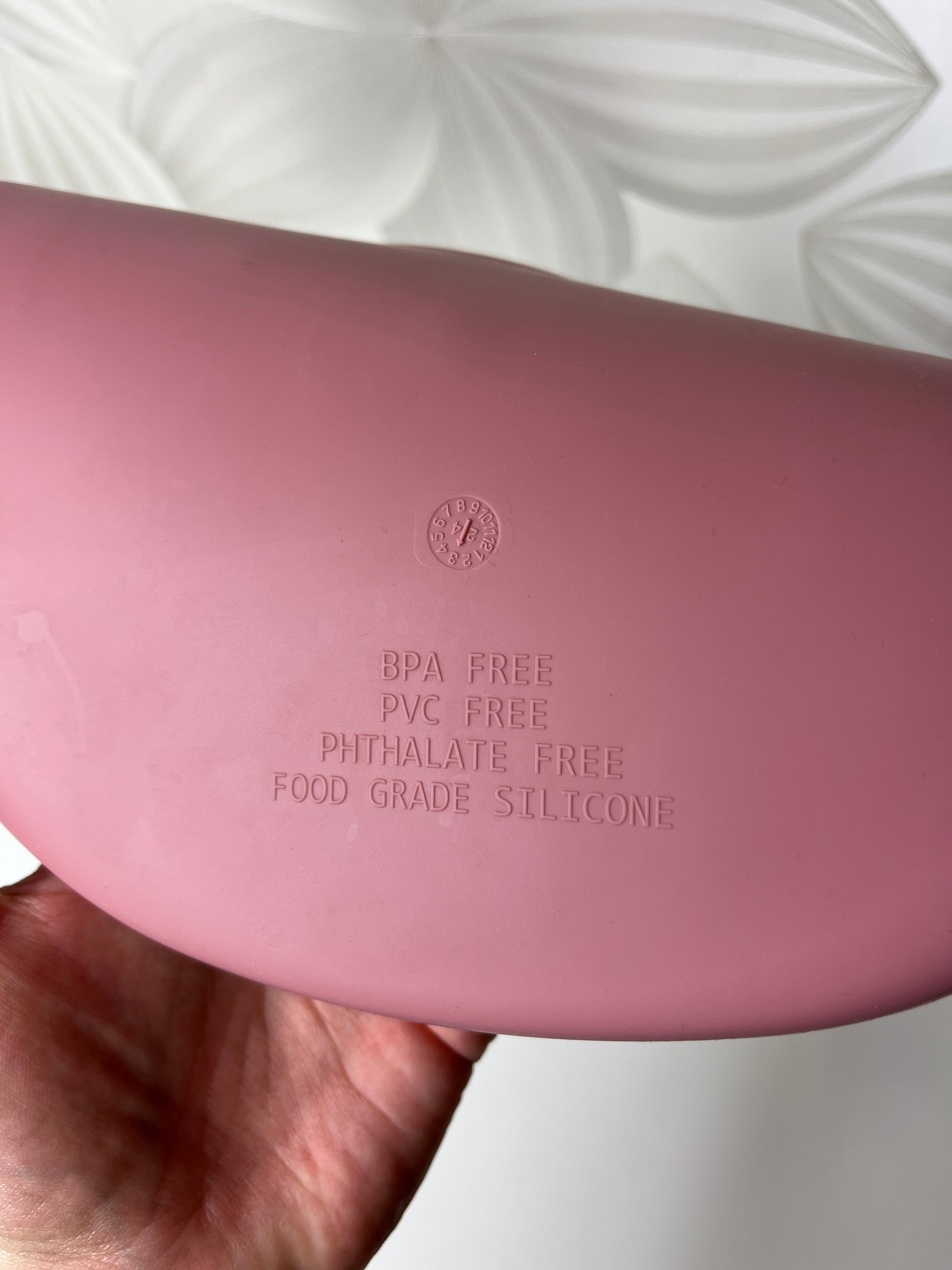 Rausvas silikoninis seilinukas vaikui