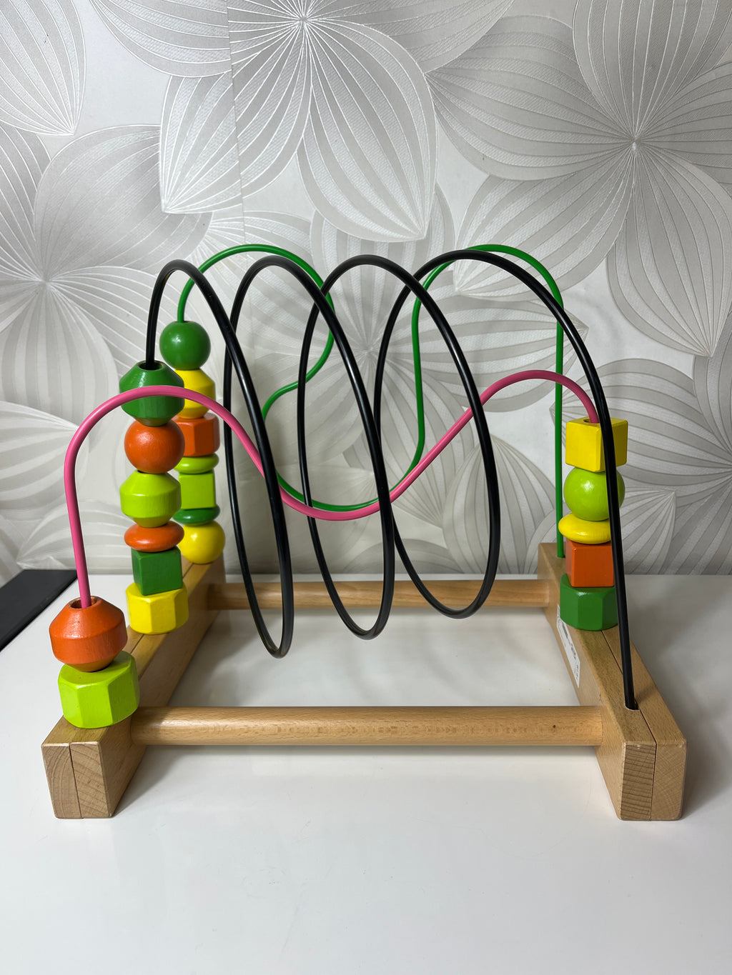 Lavinamasis žaislas su spalvotais kubeliais