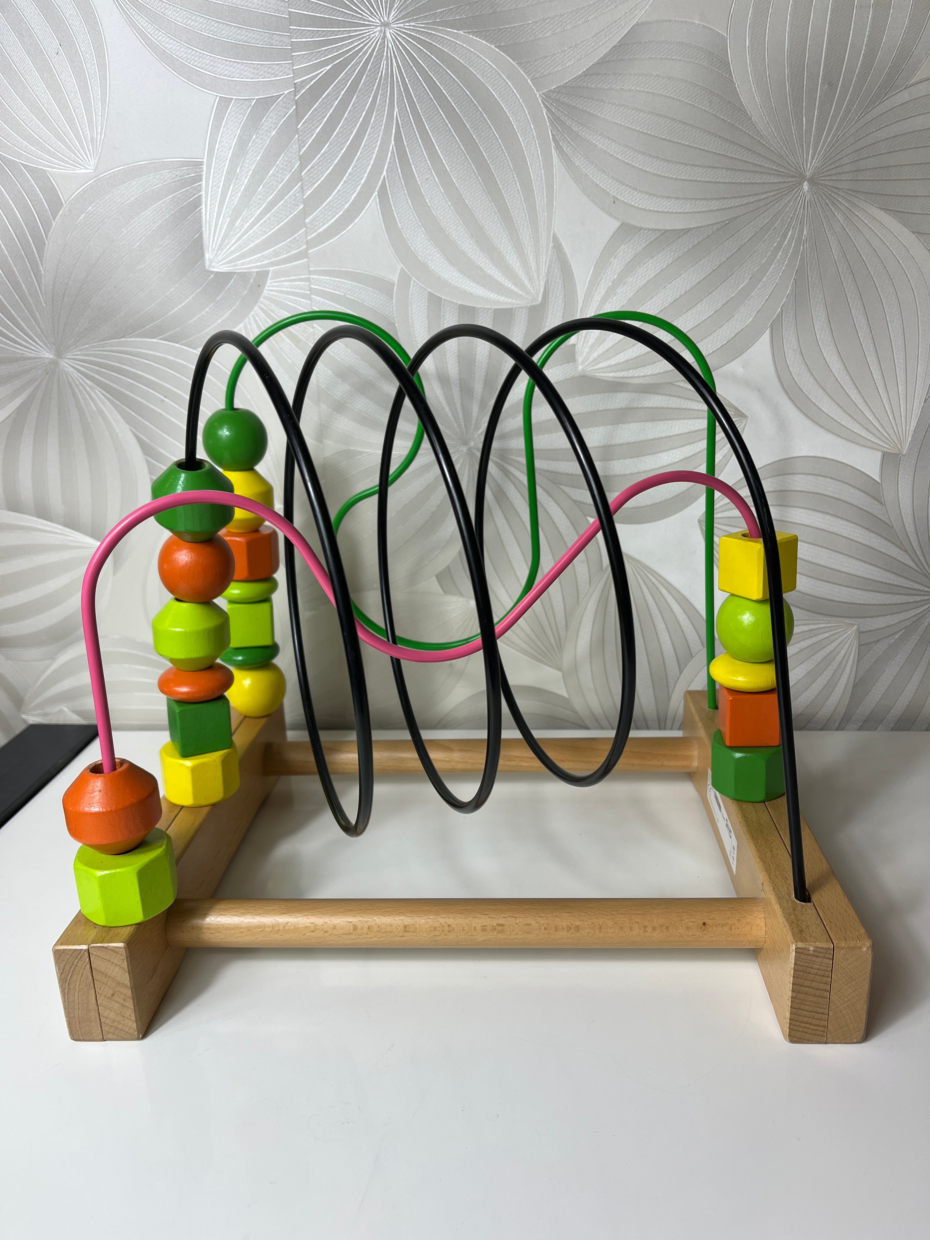 Lavinamasis žaislas su spalvotais kubeliais