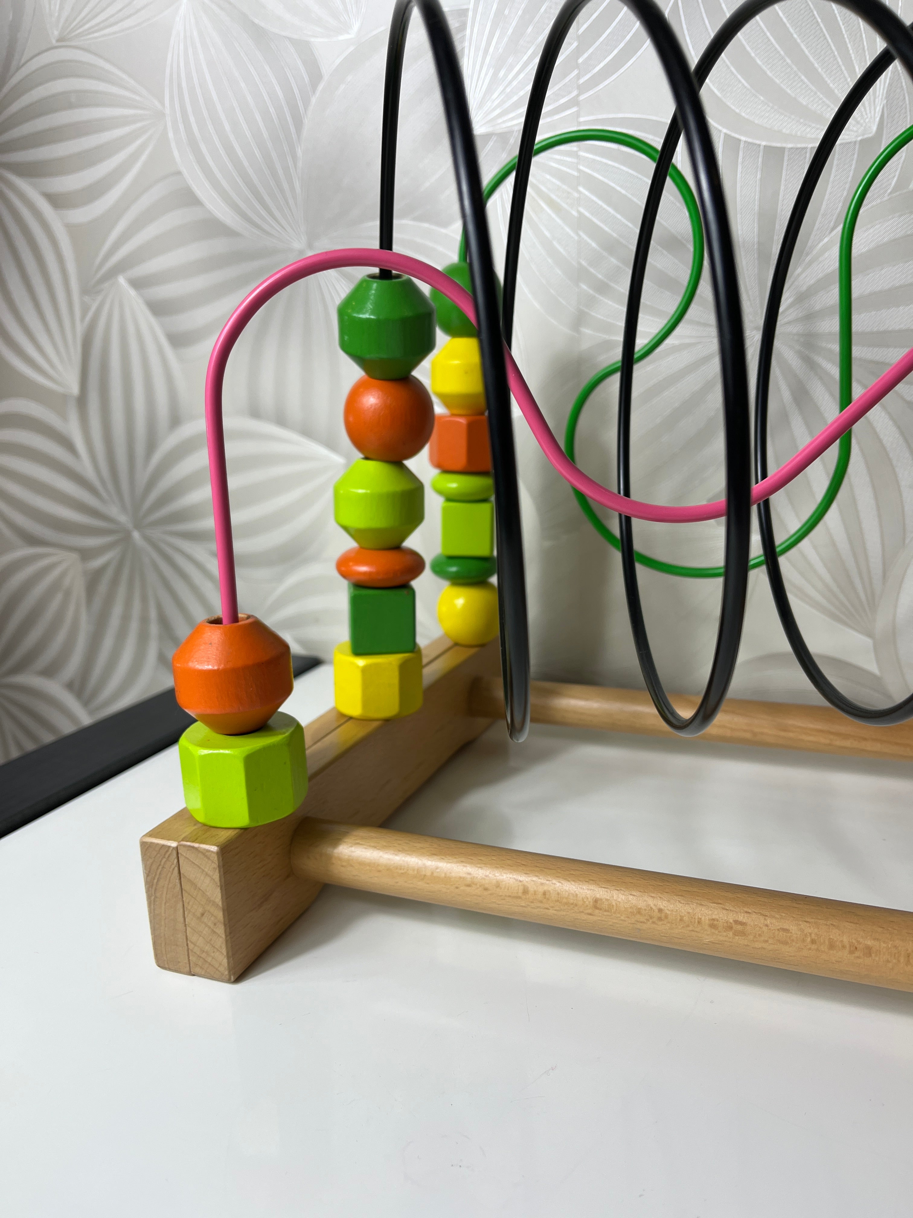 Lavinamasis žaislas su spalvotais kubeliais