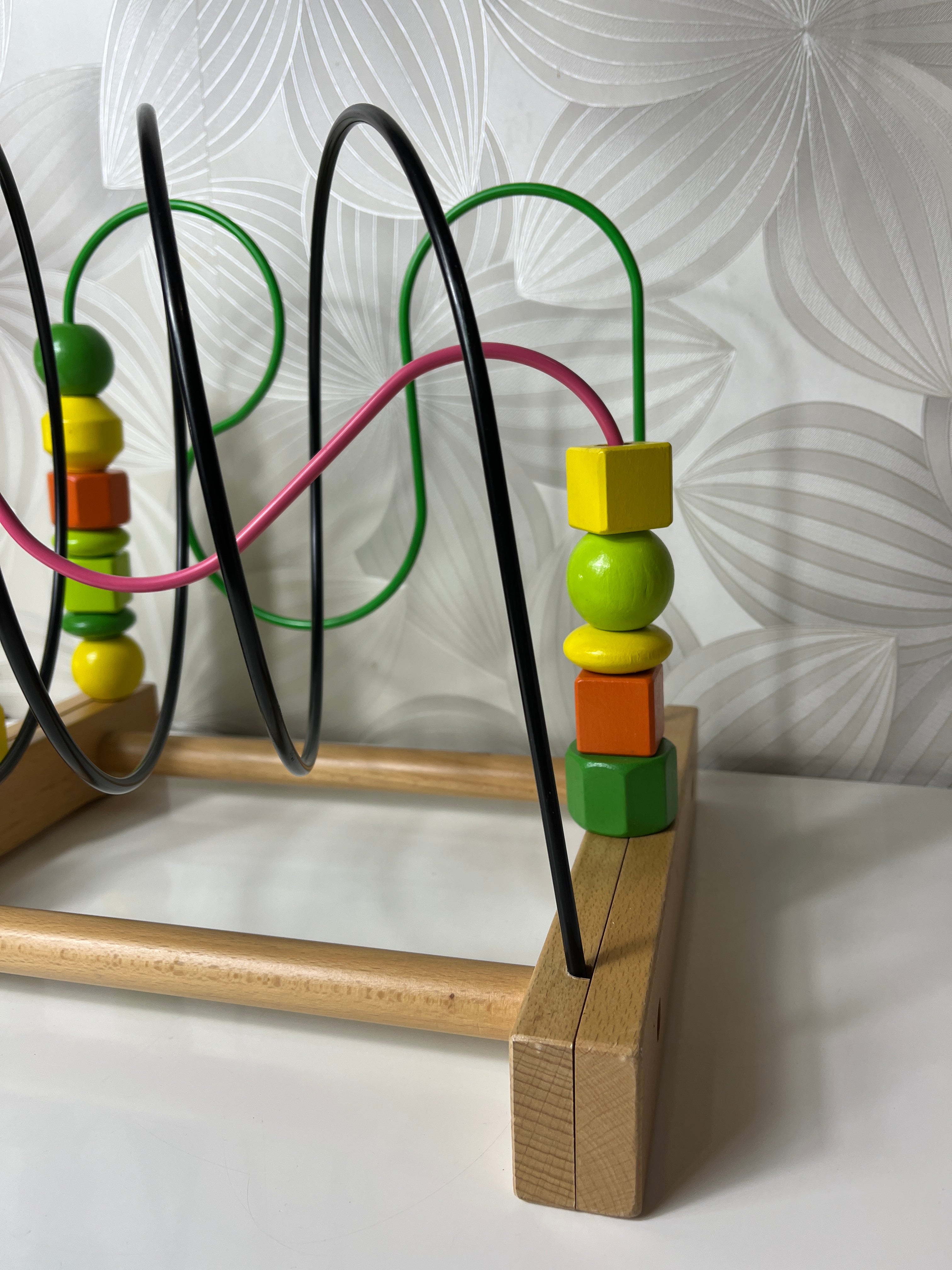 Lavinamasis žaislas su spalvotais kubeliais