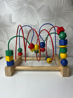 Lavinamasis žaislas su spalvotais kubeliais