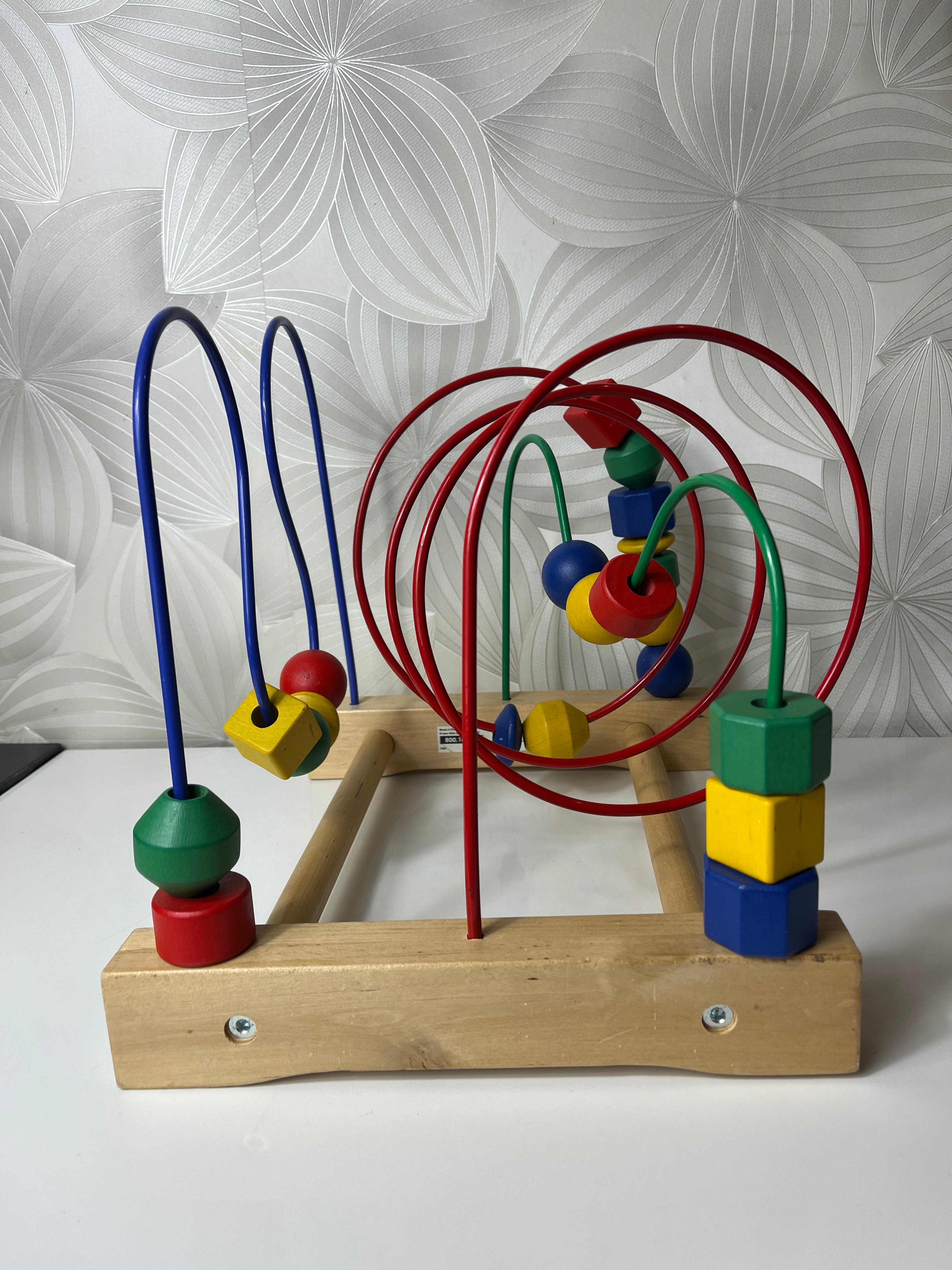 Lavinamasis žaislas su spalvotais kubeliais