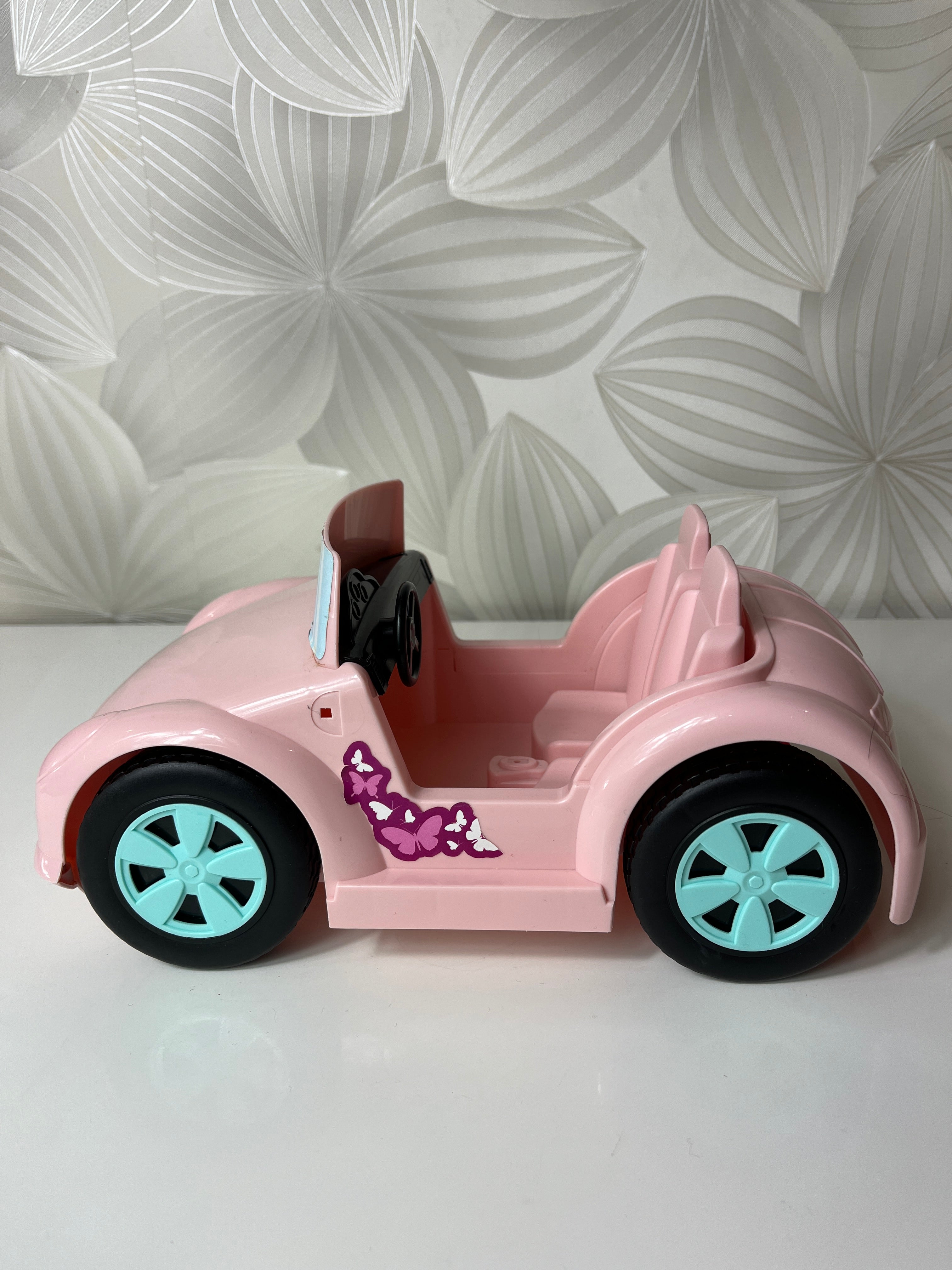 Rožinis žaislinis lėlių automobilis-kabrioletas