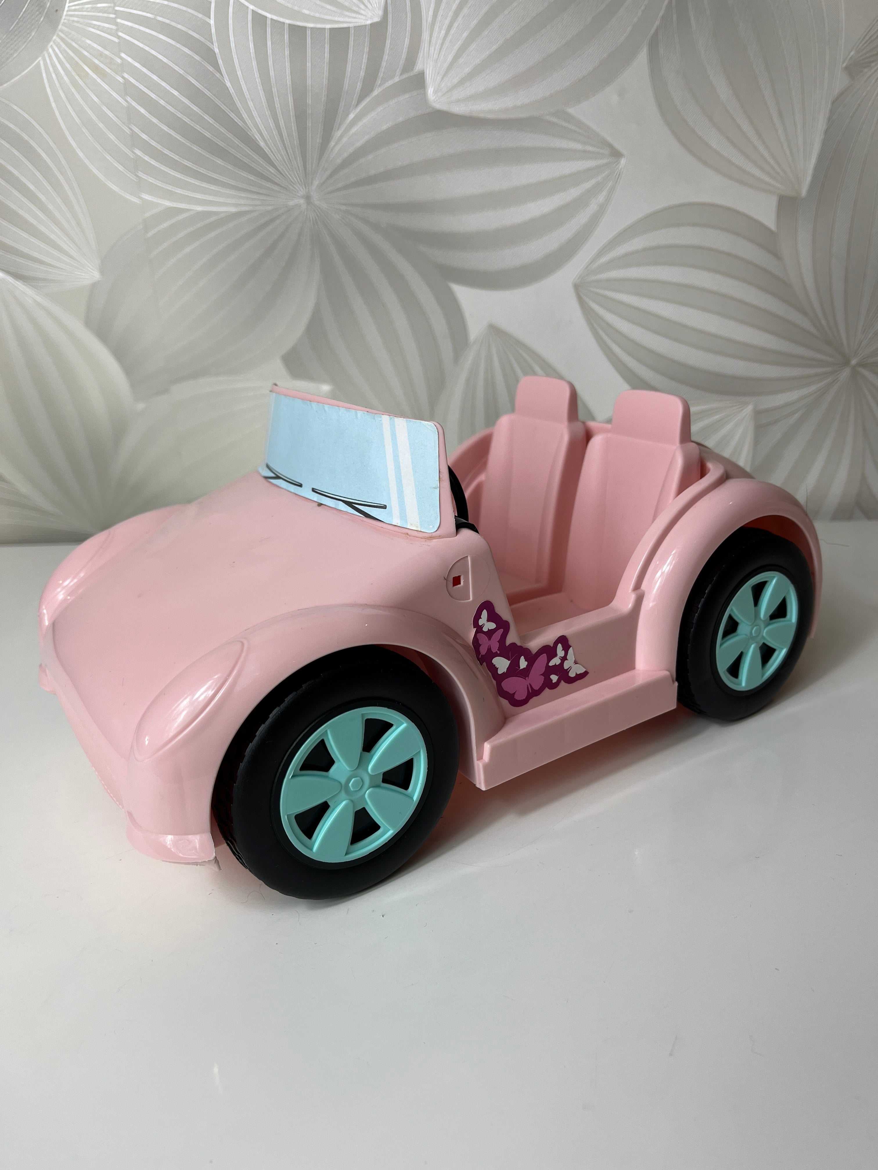 Rožinis žaislinis lėlių automobilis-kabrioletas