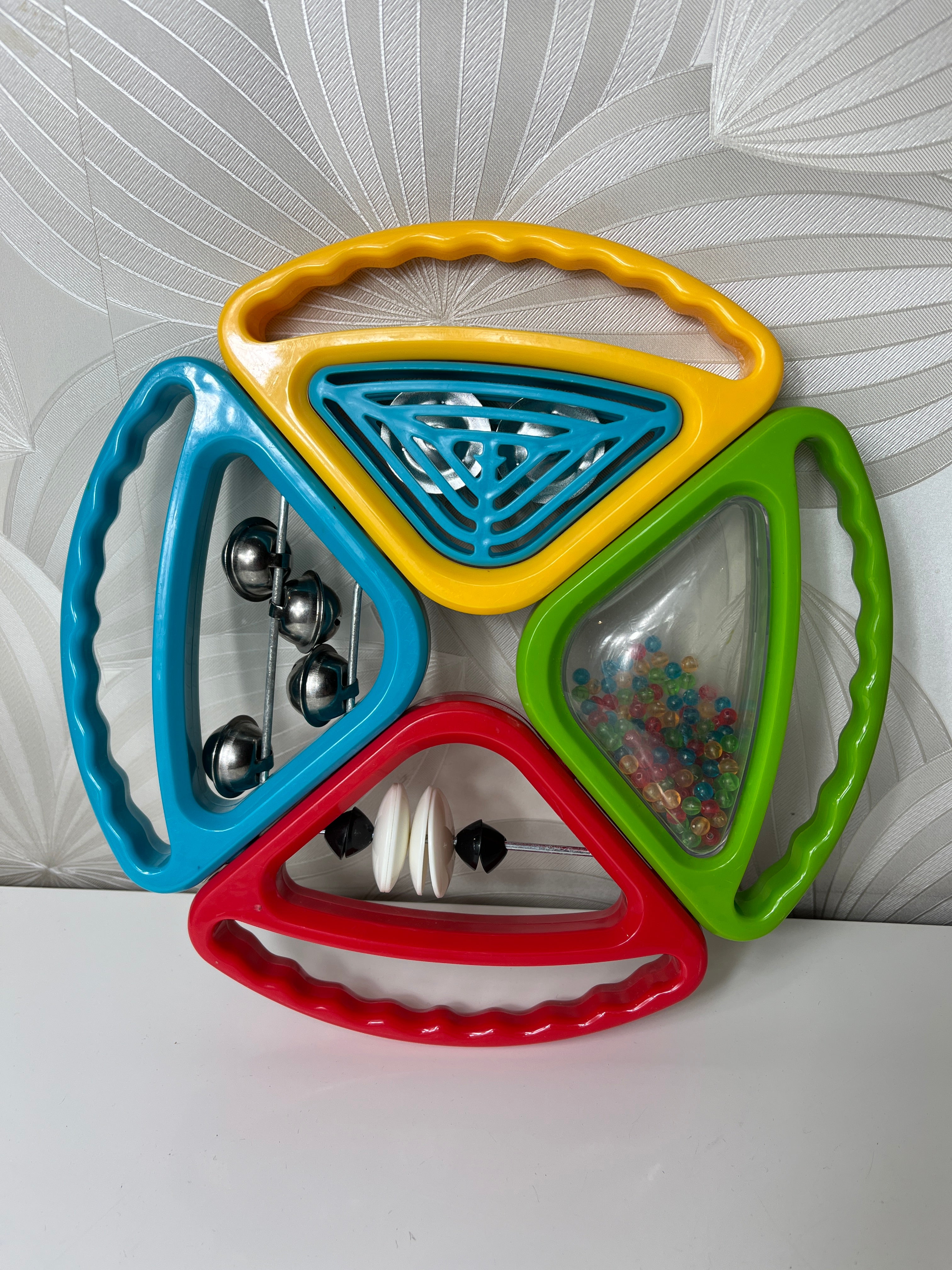 Muzikinis žaislas-barškutis mažyliams iš 4 dalių