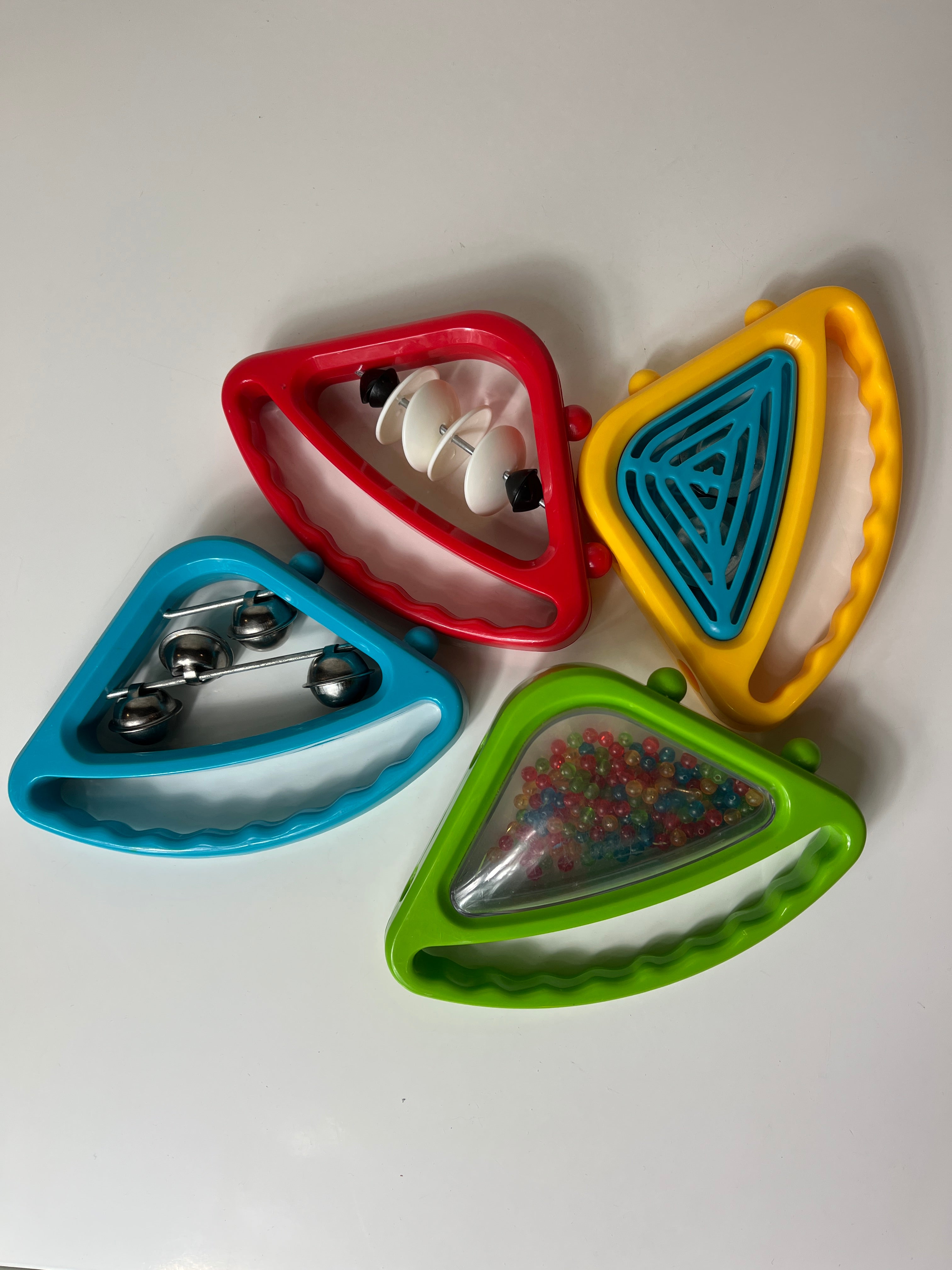 Muzikinis žaislas-barškutis mažyliams iš 4 dalių