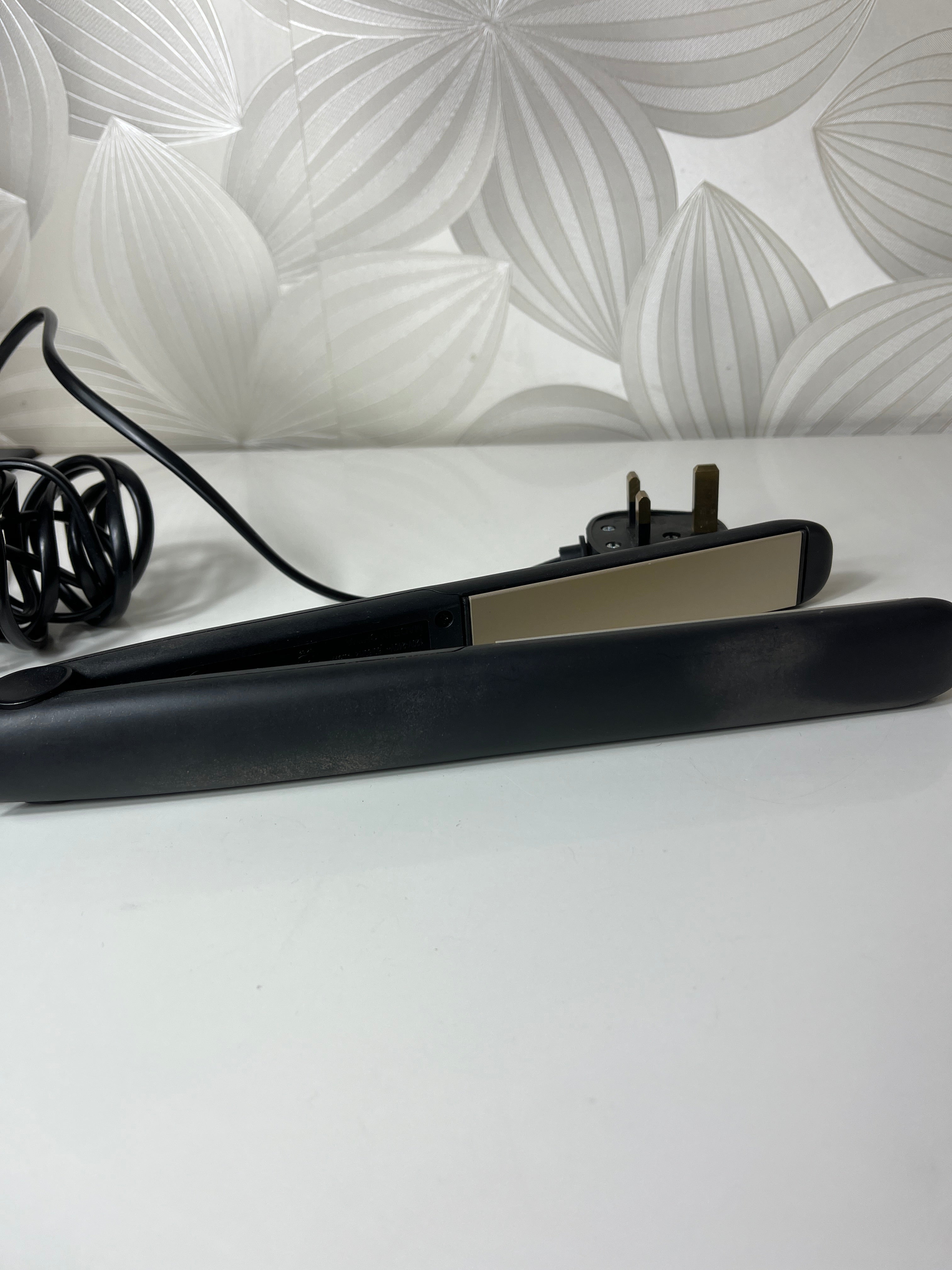 „Remington“ plaukų tiesintuvas