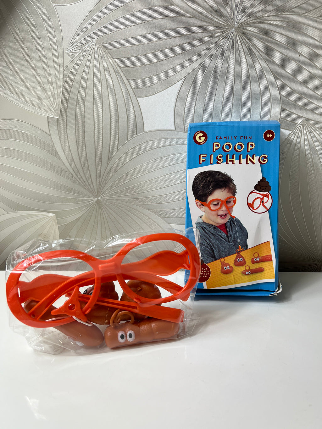 Stalo žaidimas „Poop Fishing“