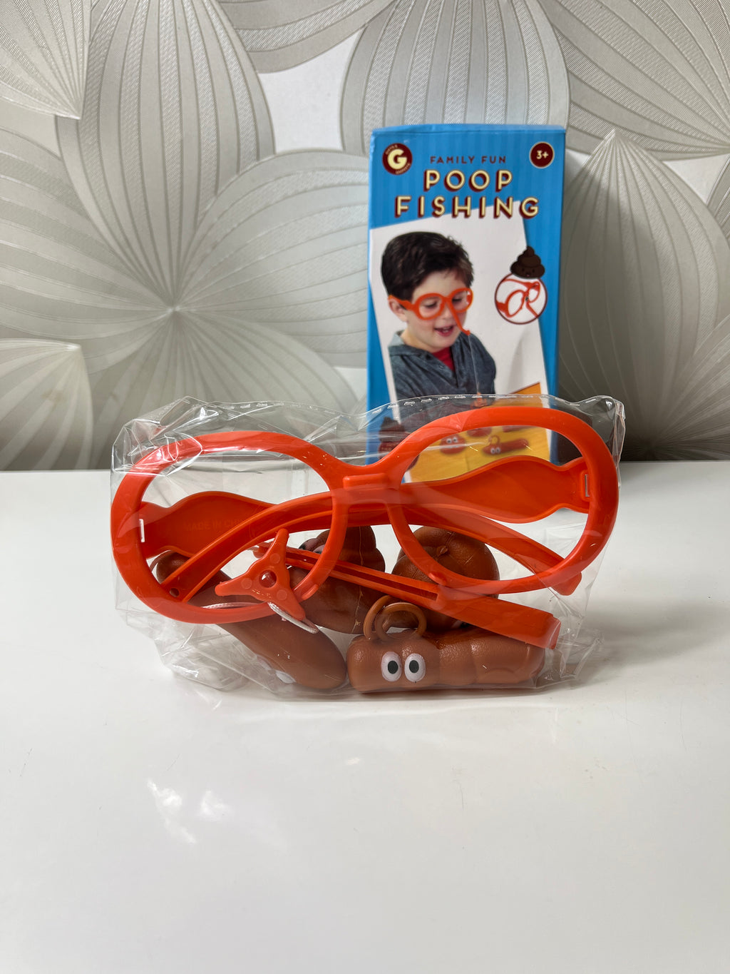 Stalo žaidimas „Poop Fishing“