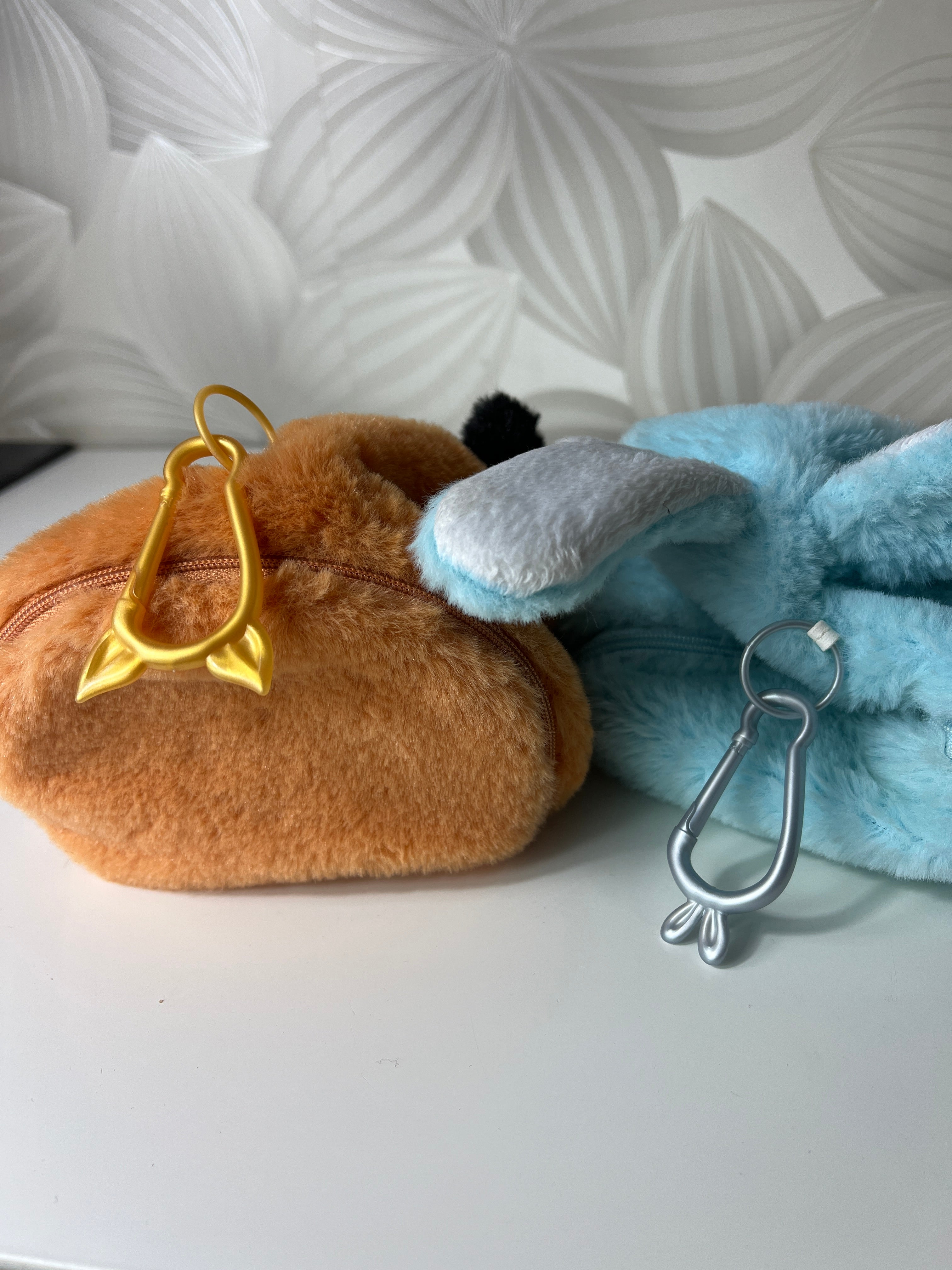 Pliušinės piniginės-aksesuarai lapė ir zuikutis iš „Na Na Na Surprise“