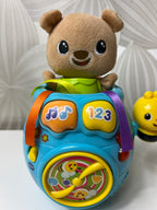 Lavinamasis „VTech“ meškučio žaislas su bitute