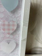 Dekoratyvinė širdelių rėmelio kompozicija