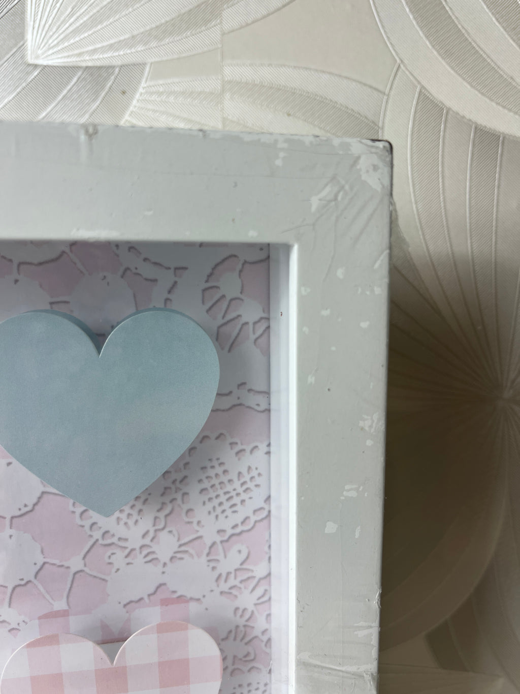 Dekoratyvinė širdelių rėmelio kompozicija