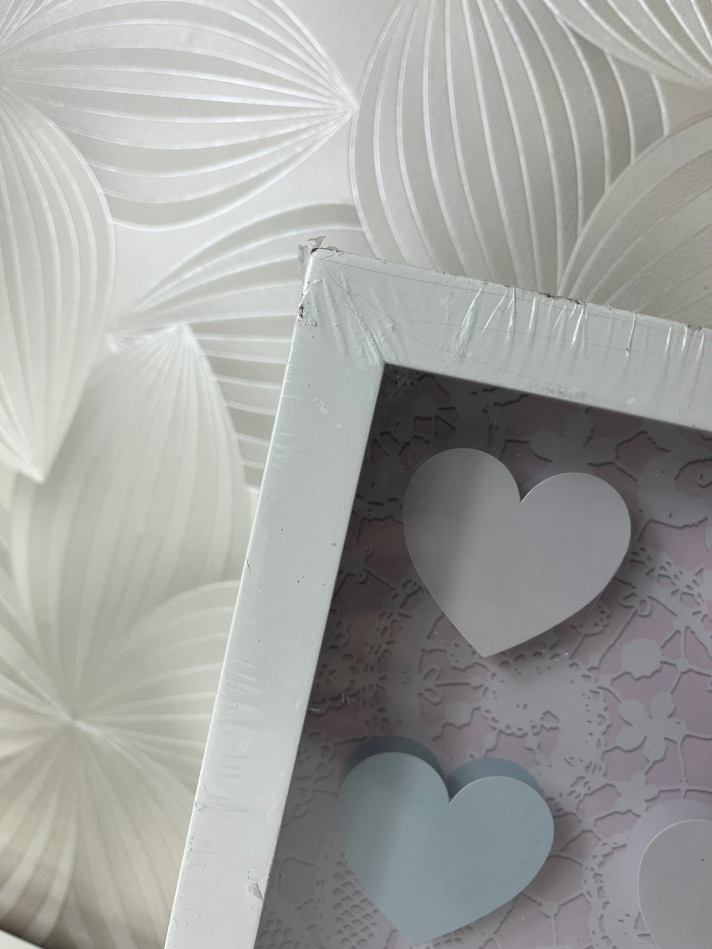 Dekoratyvinė širdelių rėmelio kompozicija