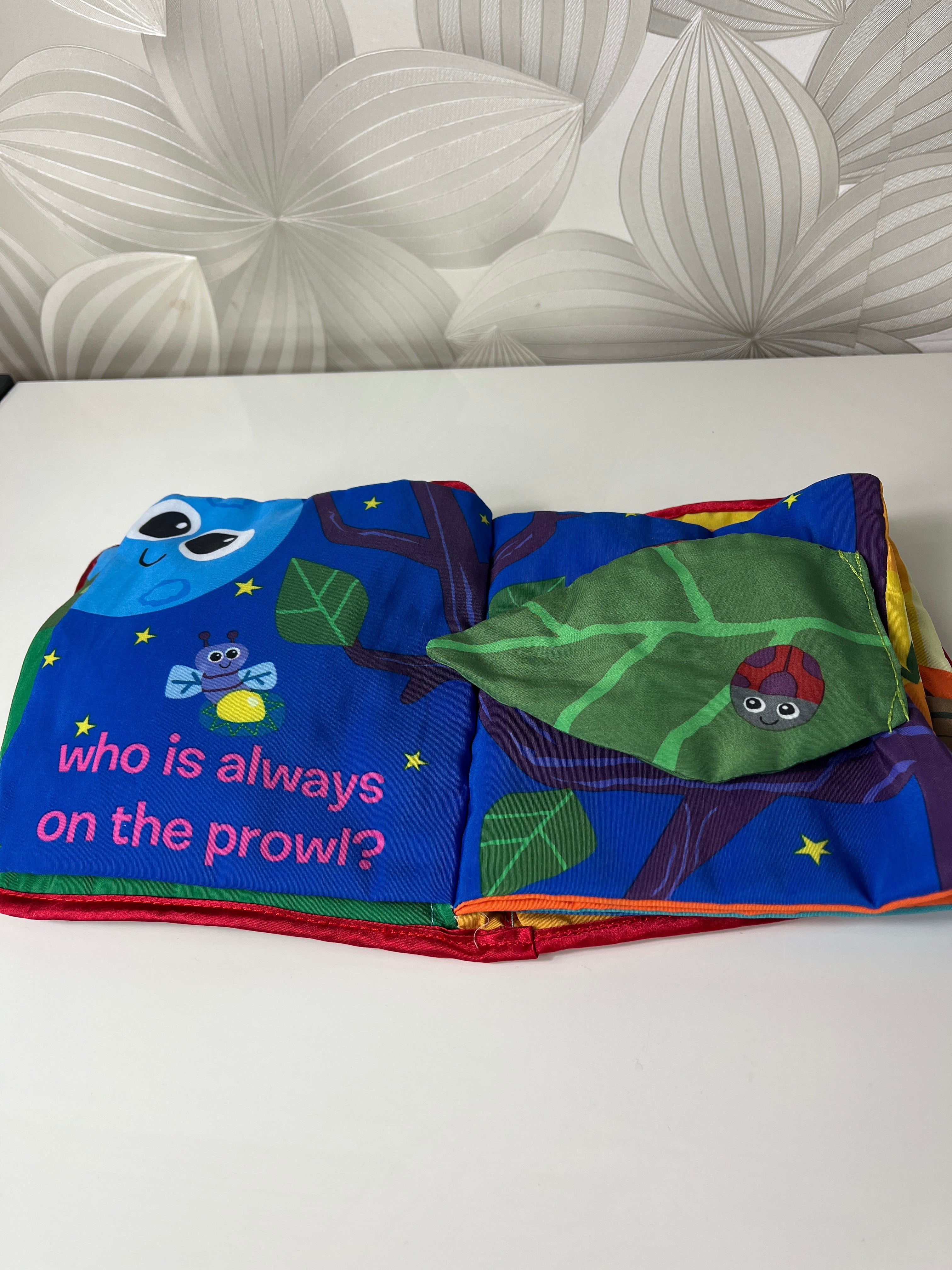 Minkšta knygelė „Peek-a-Boo Forest“ (Lamaze)