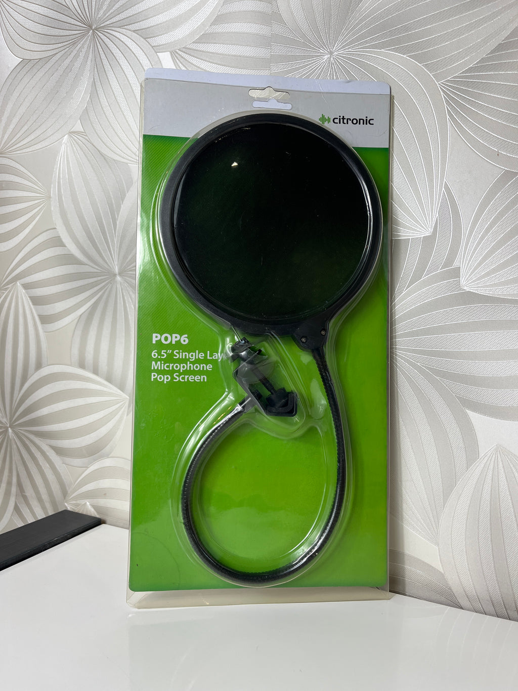 Primontuojama apsauga mikrofonui