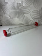 Vintažinis kočėlas su raudonais dangteliais