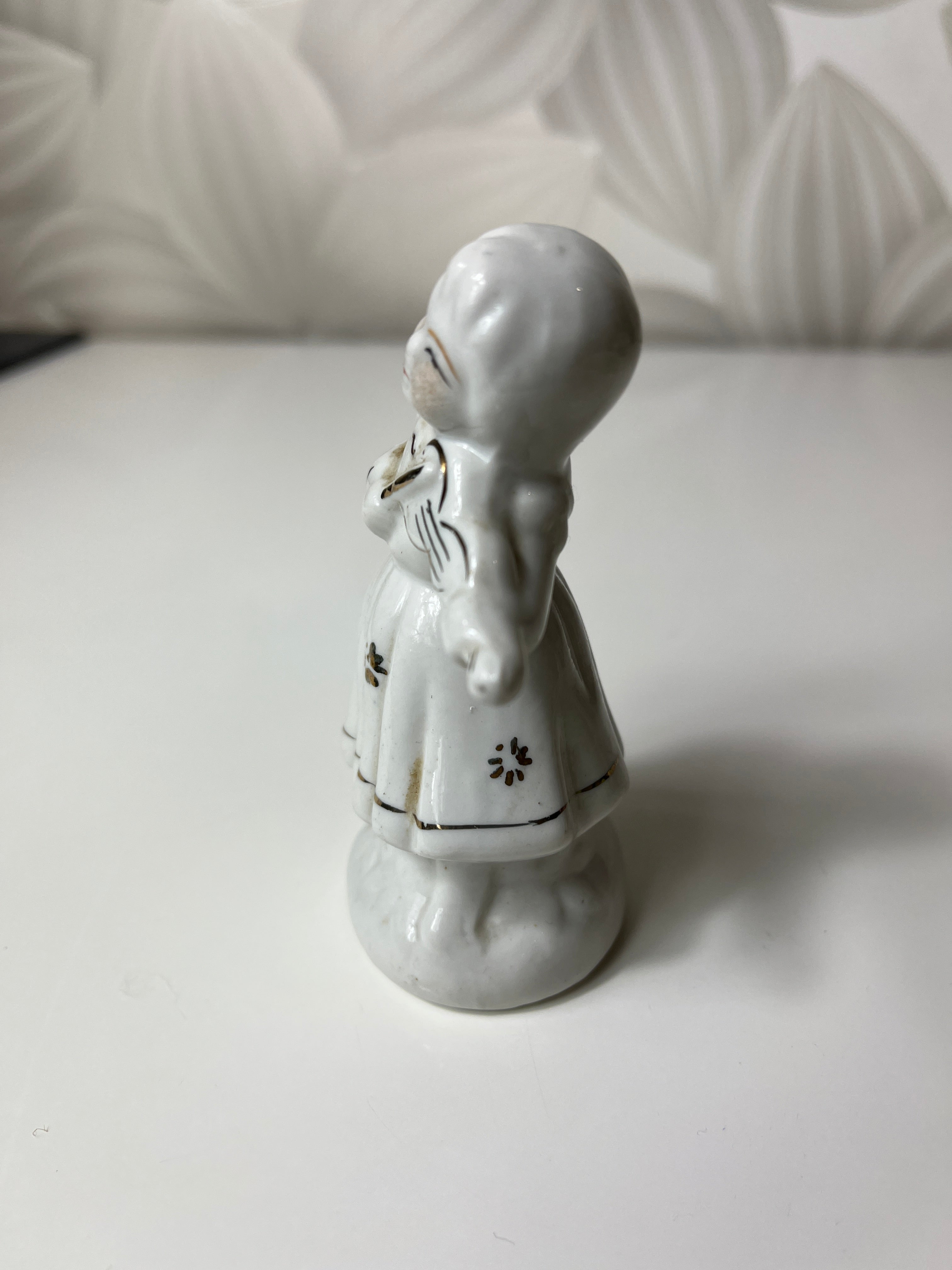 Vintažinė porcelianinė smuikininkės figūrėlė