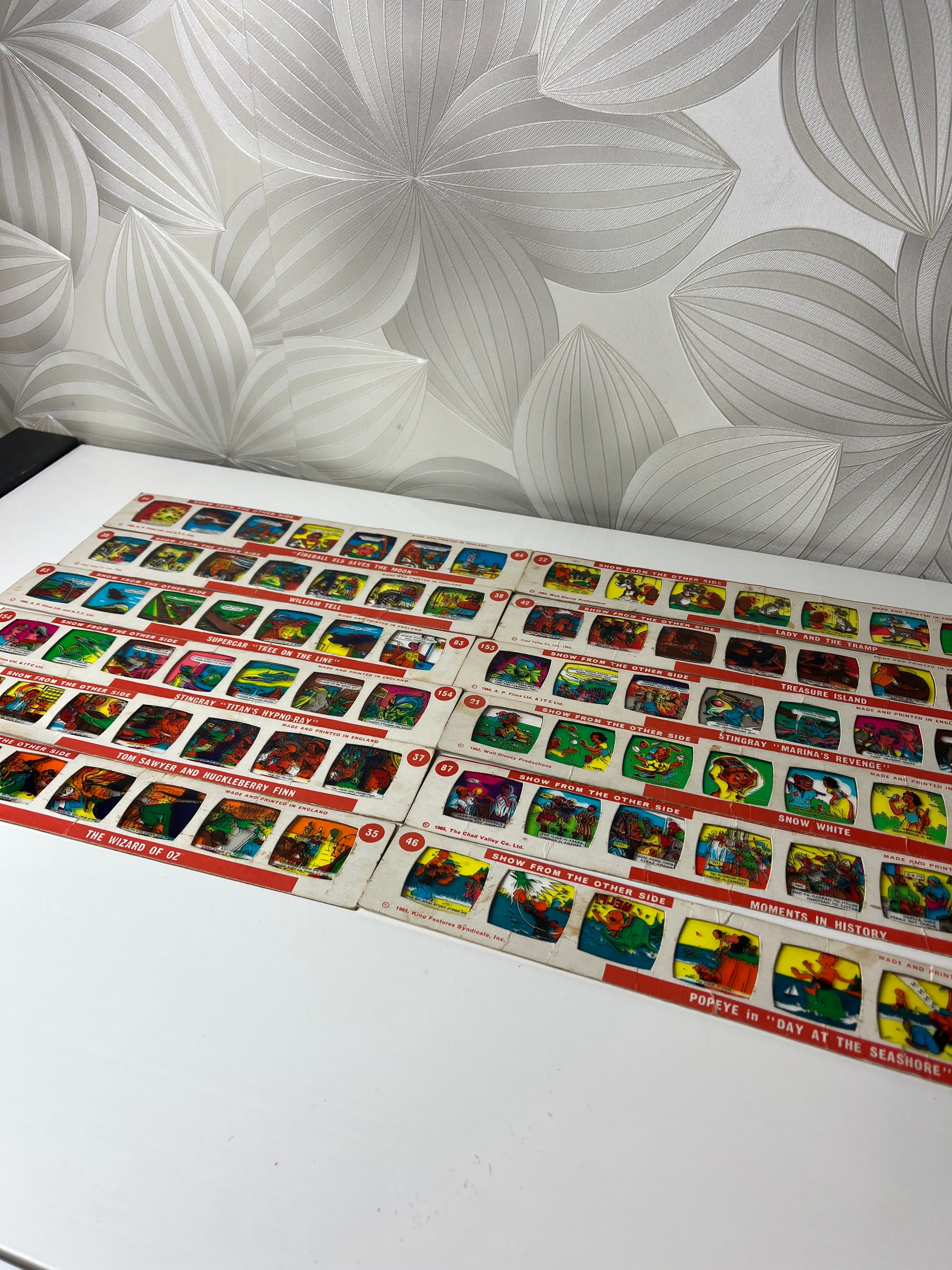 Vintažinės kino skaidrės – komiksai (12 vnt.)