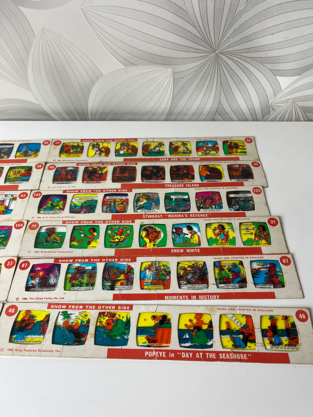 Vintažinės kino skaidrės – komiksai (12 vnt.)