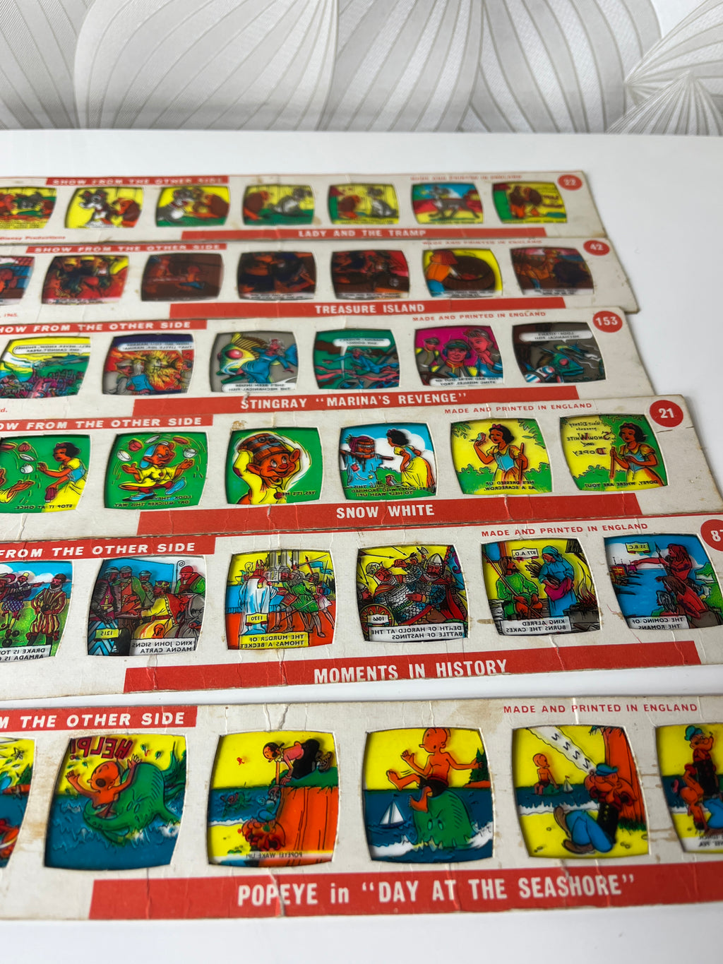 Vintažinės kino skaidrės – komiksai (12 vnt.)