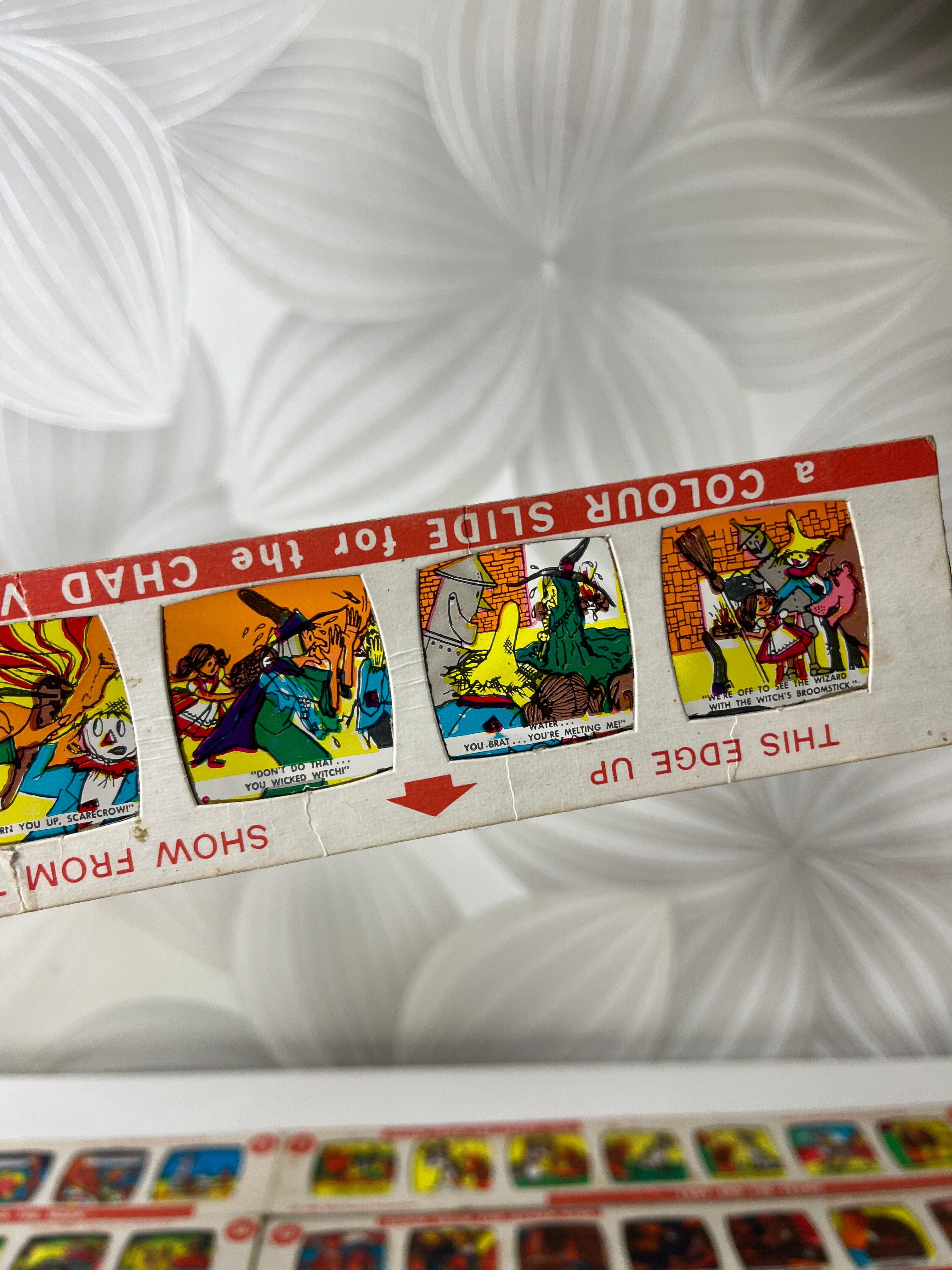 Vintažinės kino skaidrės – komiksai (12 vnt.)