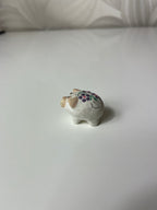 Maža keramikinė kiaulytė