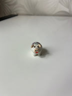 Maža keramikinė kiaulytė