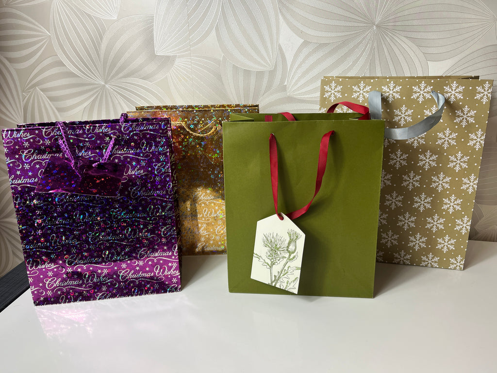 Kalėdiniai dovanų maišeliai (4 vnt.)