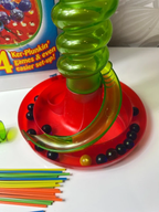 Stalo žaidimas „KerPlunk“ - Daiktų atokvėpis